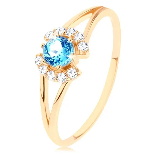 prstan-iz-rumenega-14k-zlata-prozorna-cirkonska-loka-okrogel-moder-topaz